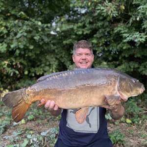 Carp out of Tockenham Lake - Amalgamated Fisheries