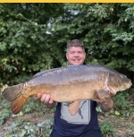 Carp out of Tockenham Lake - Amalgamated Fisheries